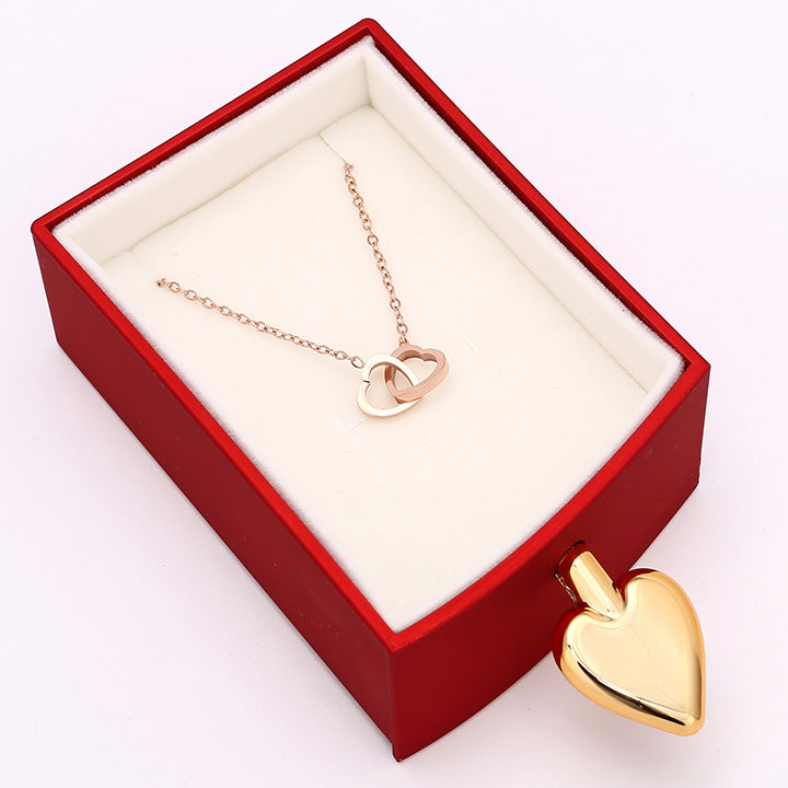 Amour Rosenbox mit versteckter Doppelherzkette - Liebesketten